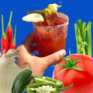 hand holding a bloody mary cocktail with cutout vegetables surrounding the hand